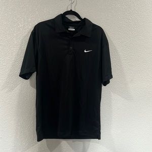 Nike golf shirt.